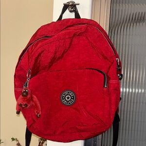 Kipling Vibrant Red Backpack- excellent preowned condition- clean-comes w/monkey